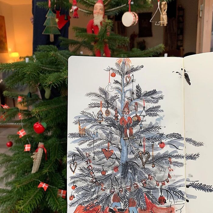 Christmas tree drawing with ornaments, inspired by festive holiday prompts, sketched in front of a real decorated tree.