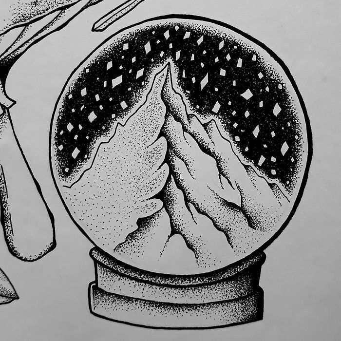 Mountain landscape illustration inside a snow globe, using drawing prompts for creative inspiration.