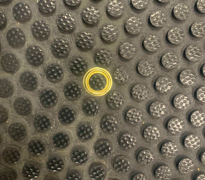 Metal Grommet Fell Onto A Floor Mat At My Work
