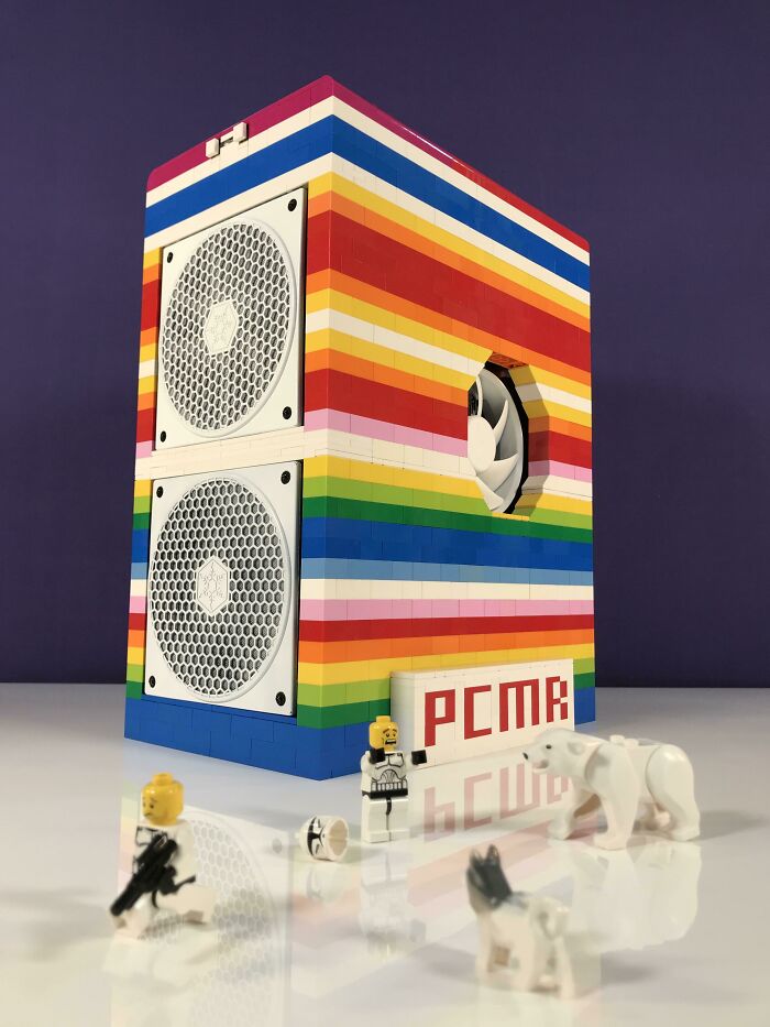 Colorful LEGO build resembling a computer case with fans and mini LEGO figures, showcasing incredible LEGO builds art.
