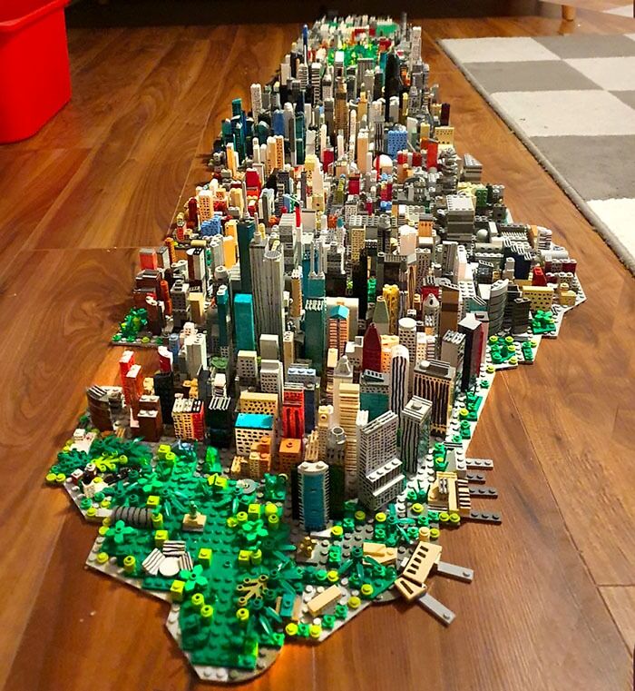 Detailed LEGO builds of a cityscape with intricate buildings and green spaces showcasing incredible LEGO art and design.