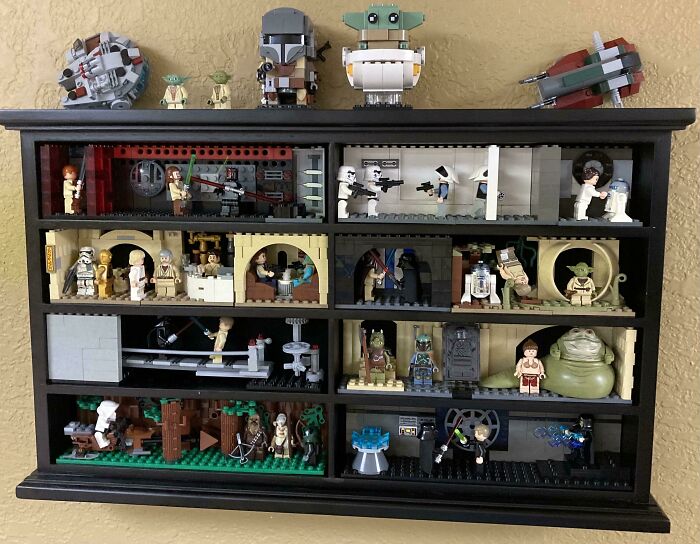 LEGO builds featuring detailed Star Wars characters and scenes displayed in a shadow box showcase of incredible LEGO builds.
