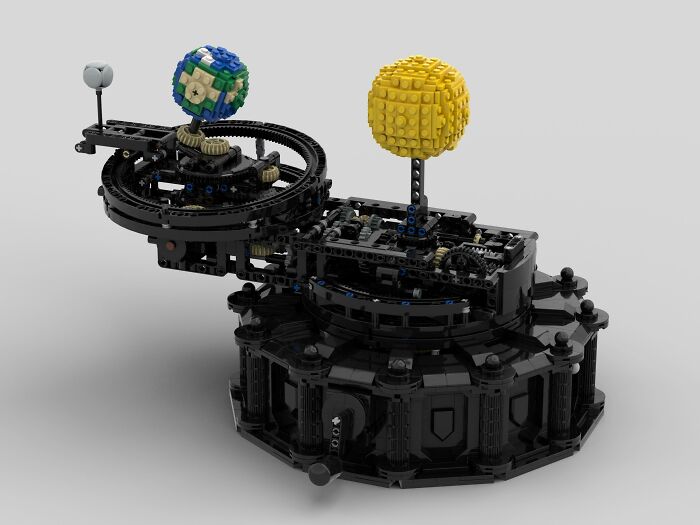 Mechanical LEGO build featuring a detailed model of the Earth and Sun, showcasing incredible LEGO art and engineering.