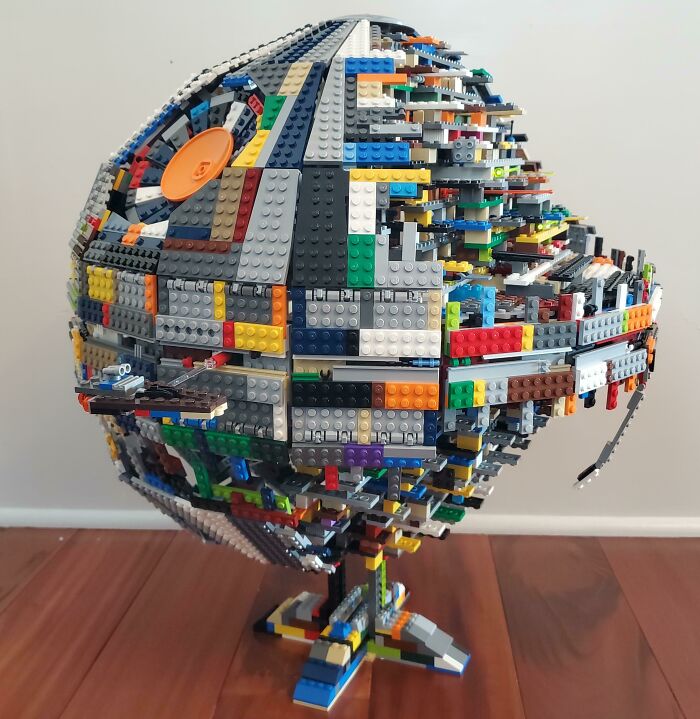 Intricate LEGO build resembling a sci-fi sphere with colorful bricks, showcasing impressive creativity and engineering skills.