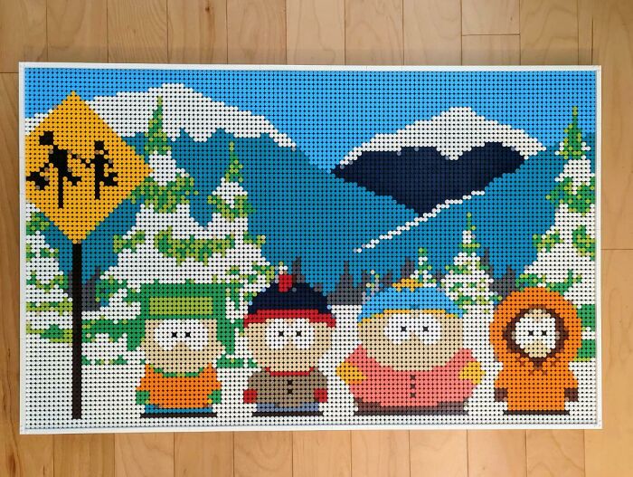 Pixel art LEGO build of four cartoon characters in a snowy mountain scene, showcasing incredible LEGO builds as real art.