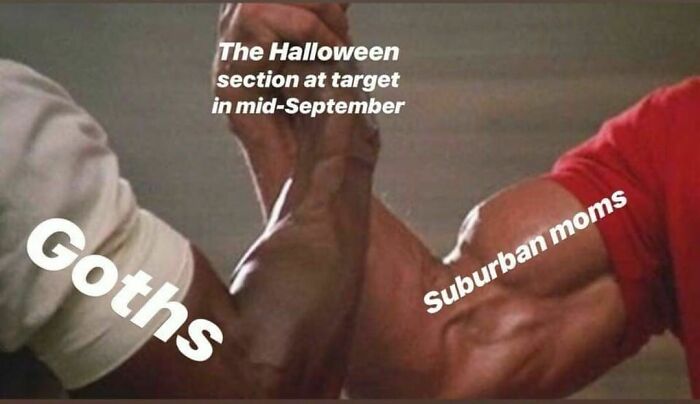 Goths and suburban moms arm-wrestling, labeled "The Halloween section at Target in mid-September," highlighting spooky humor.