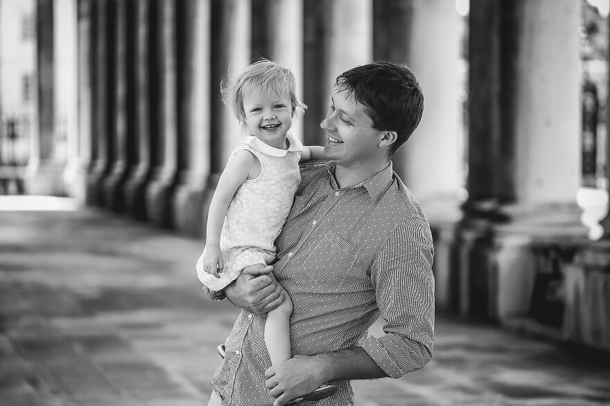 Black and white photograph of a dad with his daughter