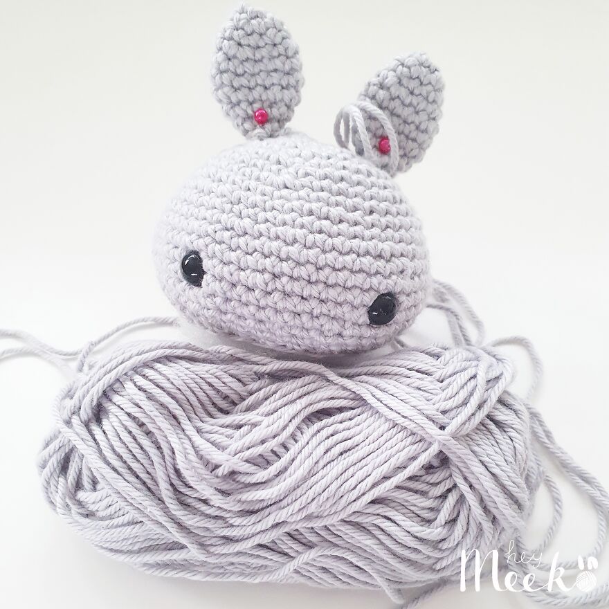 Crochet bunny with yarn, showcasing a side hustle craft to brighten people's days.