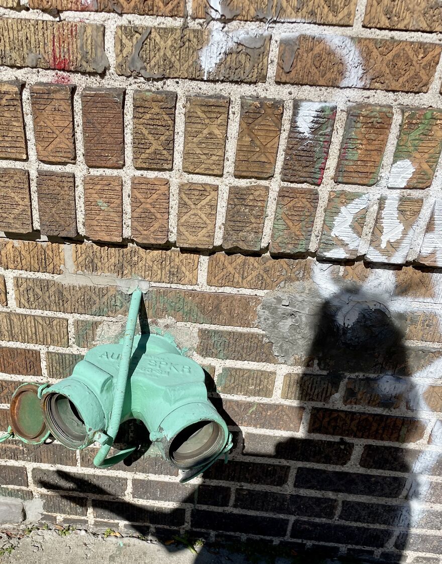 Beautiful Sea-Foam Green Standpipe With Open Covers With My Shadow Cradling It