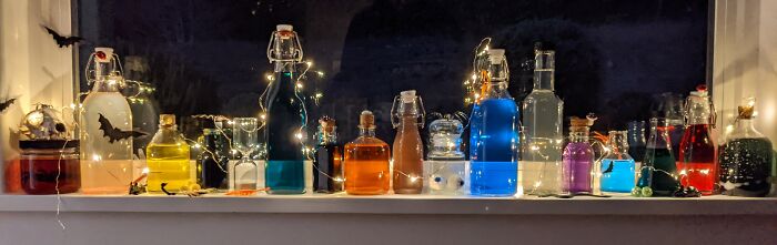 A Windowsill Full Of Halloween Potions