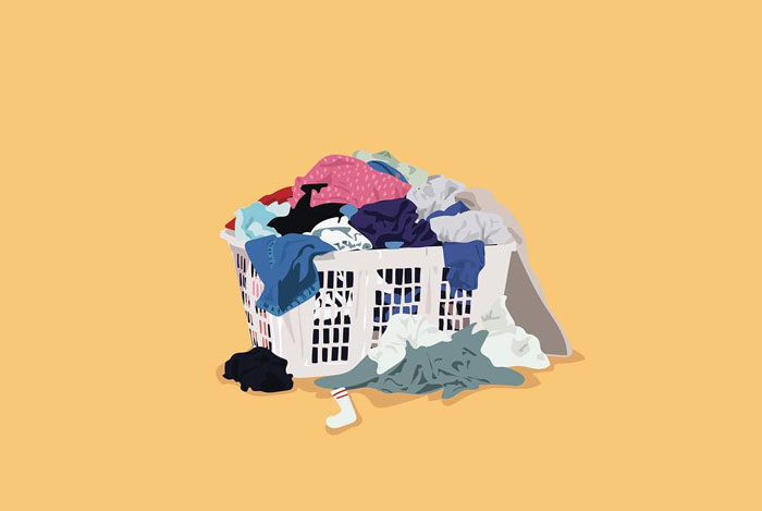 Laundry basket overflowing with clothes, a unique drawing prompt idea on a yellow background.