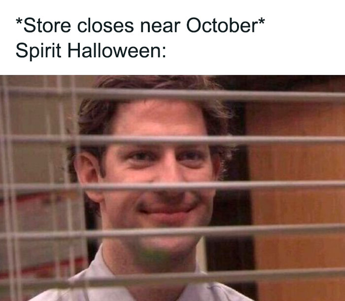 Man peering through blinds with a knowing look; humorous Halloween meme about Spirit Halloween.