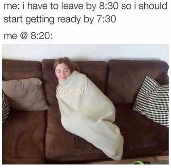 Person wrapped in a blanket on a couch, humorously showing exhaustion and overwhelming feeling.