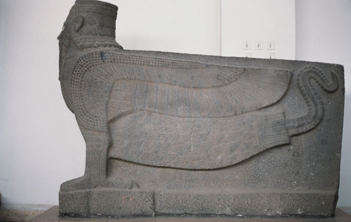 Rock statue of Scorpion Man in a museum 