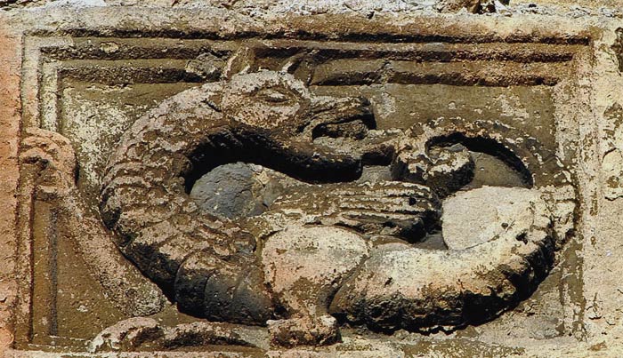 Engravings of Ouroboros on a rock 