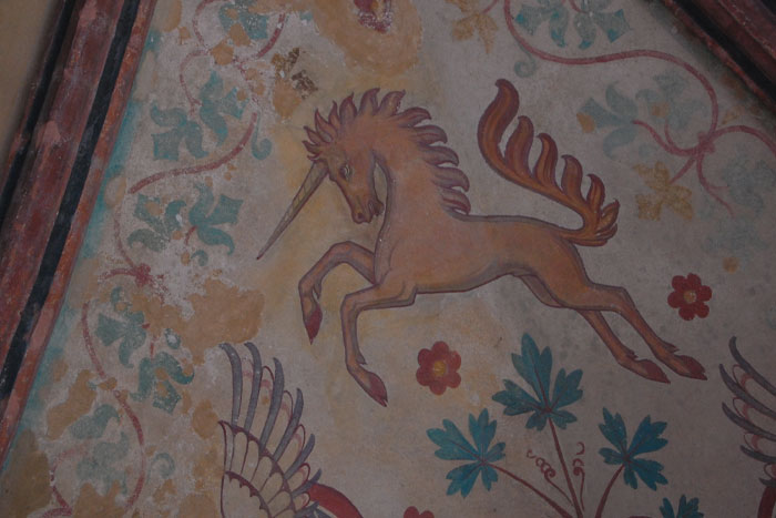 Painted colorful Unicorn on a wall 