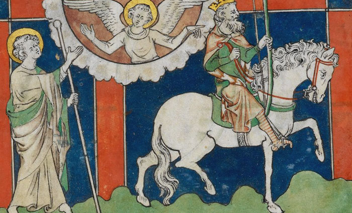 Painting of White Horse and some people on a wall 