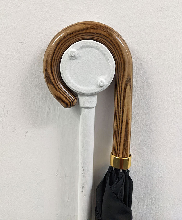 My Umbrella On This Wire Protector On The Wall