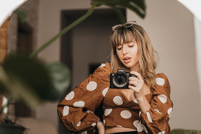 Woman picture herself in the mirror