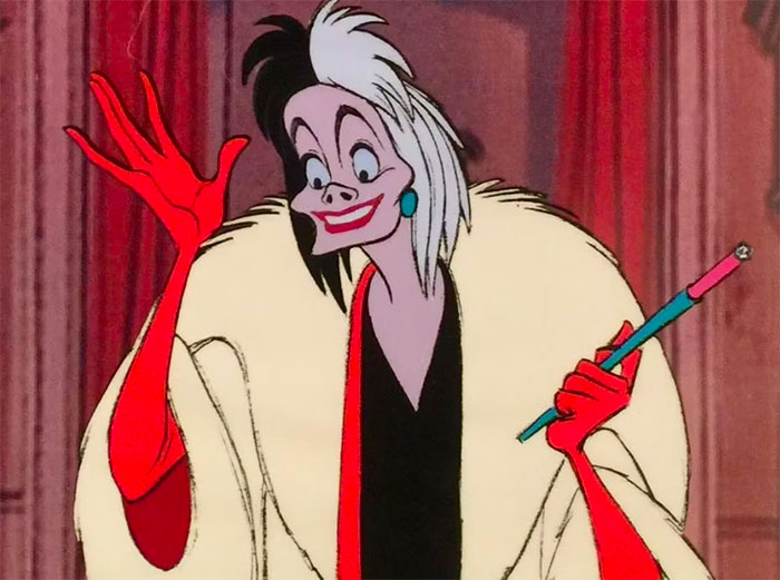 Cruella De Vil looking and smiling from 101 Dalmations