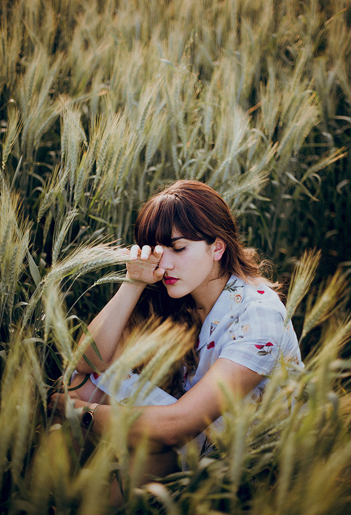 Picture of woman in the field sitting