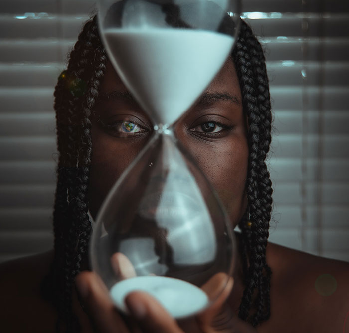 Picture of woman holding time sand