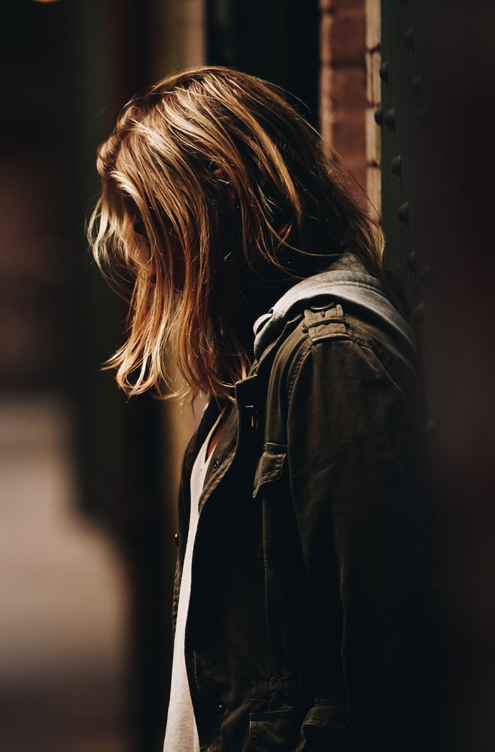 Woman standing and thinking