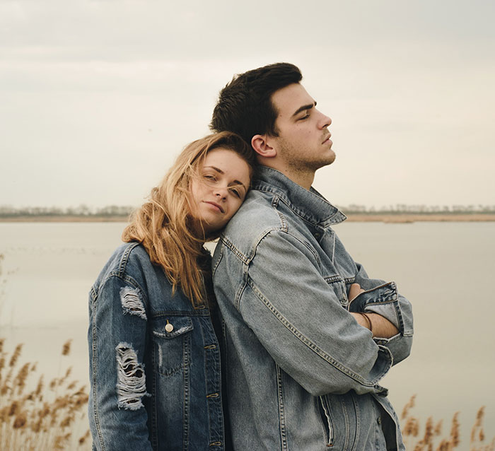 Woman and man standing and looking