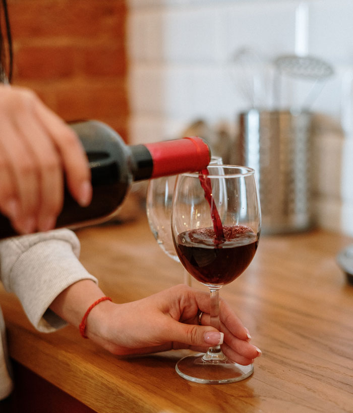 MIL Is Left Sobbing On The Floor After She Showed Up To Wedding Wearing A White Dress And One Bridesmaid "Fixed" It With Some Red Wine