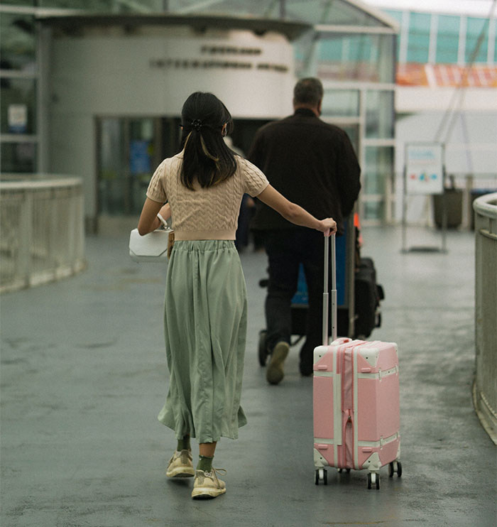 Person Asks If They're A Jerk For Saying "No" When The Police Asked If Woman Was Their Fianc&eacute;e Before Escorting Her Off The Plane