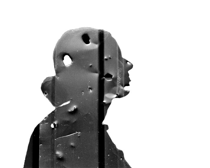 Double exposure photo of a volunteer in Ukraine by Andrii Denysenko