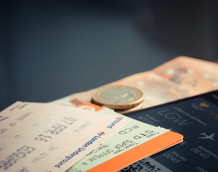 Bus/Train/Plane Tickets on table