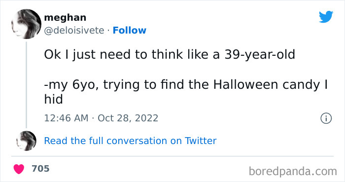 Tweet showing a funny moment of a kid searching for hidden Halloween candy, highlighting kids making parents laugh during Halloween.