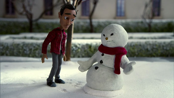 Abed talking to a snowman 
