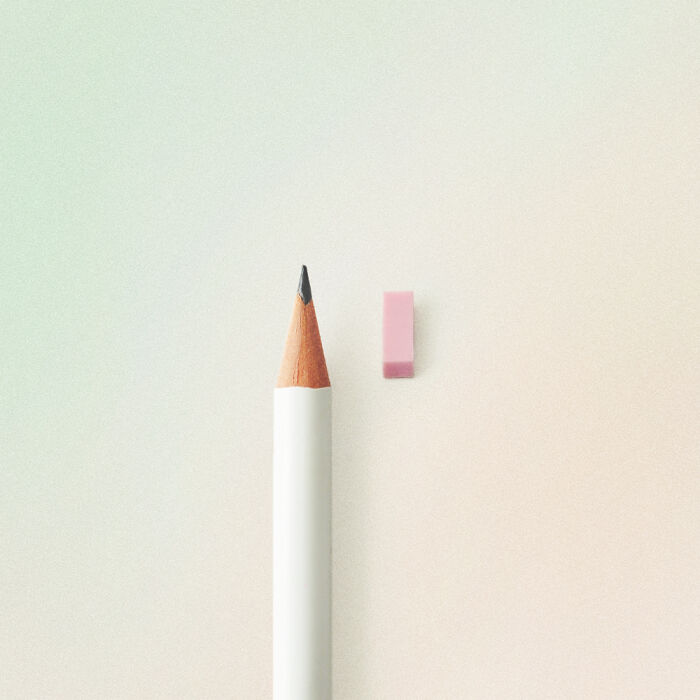 Minimalist product design featuring a sharpened pencil and small pink eraser on a soft gradient background.