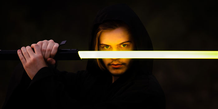 Wielding A Bare Wrapping Paper Tube As A Lightsaber