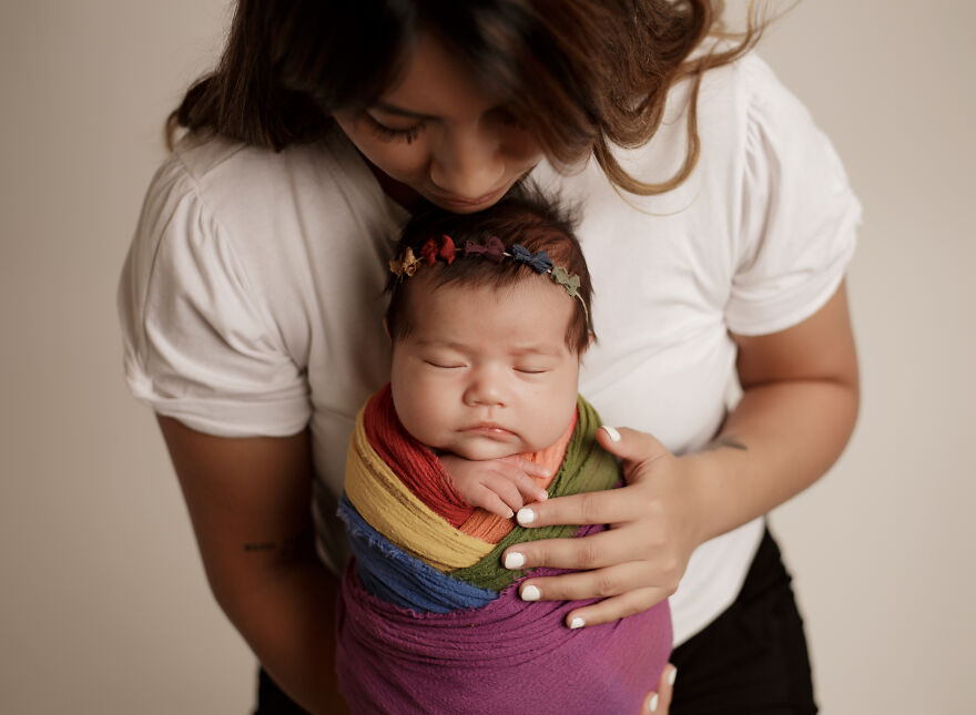 Swaddled Rainbow Baby With Mom