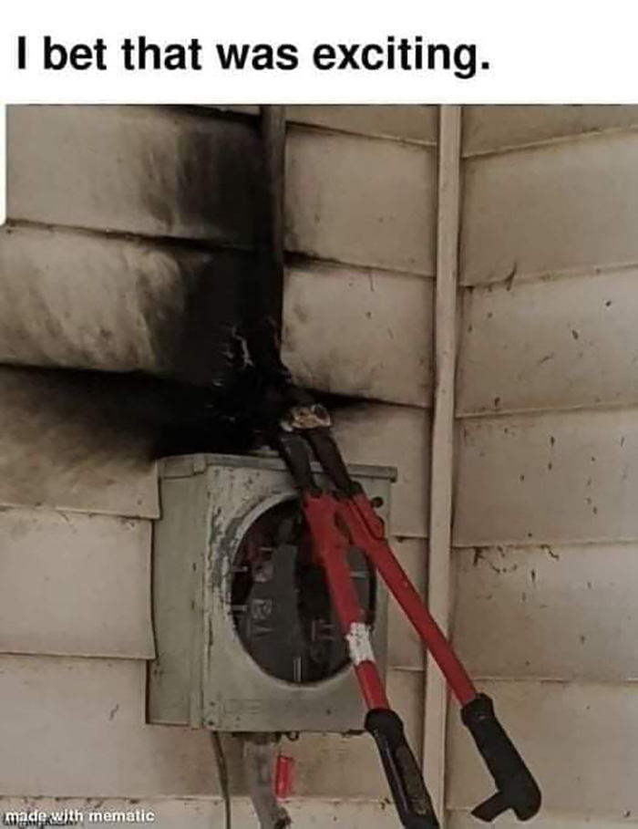 Neglected OSHA safety: Burned siding, large bolt cutters on a charred electrical box.