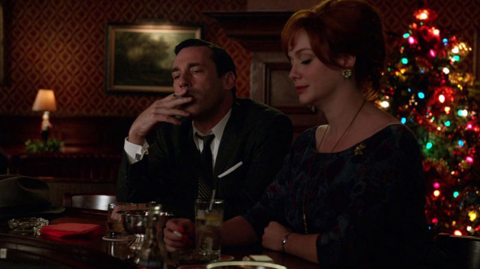 Don and Joan drinking in the bar 