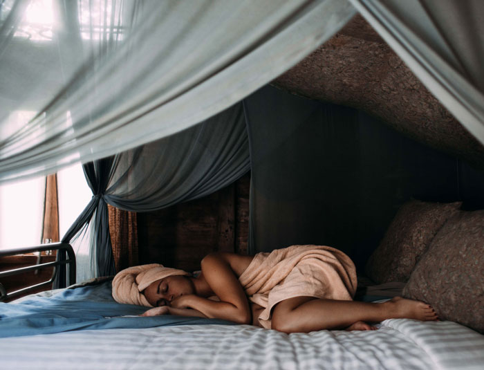 Woman sleeping on the bed