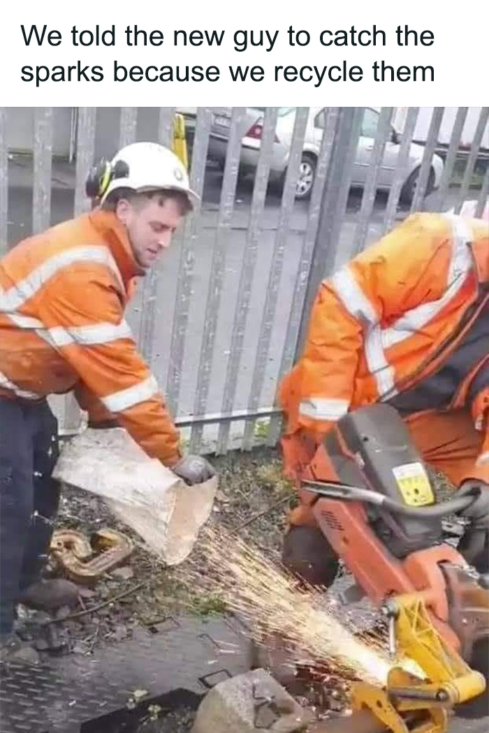 Workers ignoring OSHA safety guidelines; man holds bag near sparks from a saw.