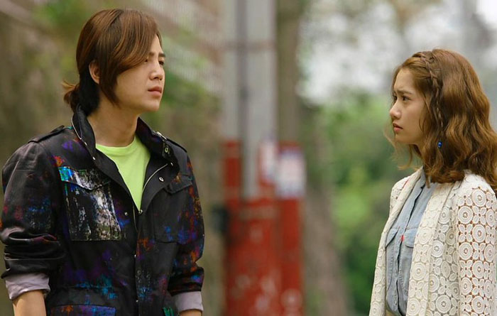 Two woman standing on the street 