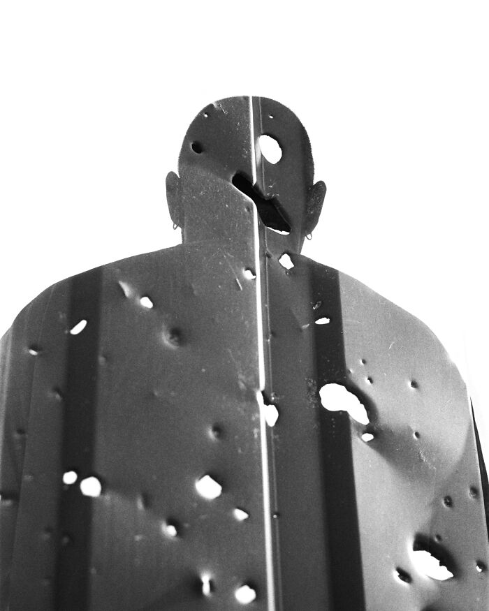 Double exposure photo of a volunteer in Ukraine by Andrii Denysenko