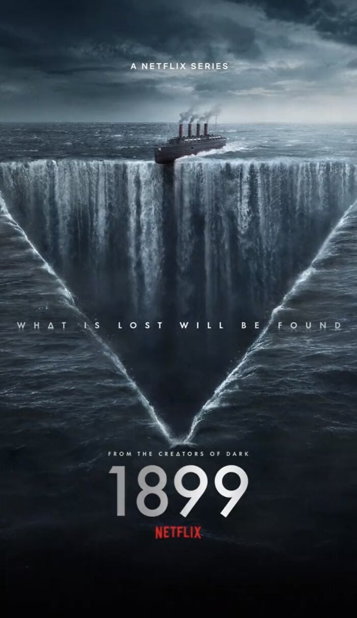 Ocean scene with a large ship approaching a terrifying waterfall in the sea under a dark and stormy sky.