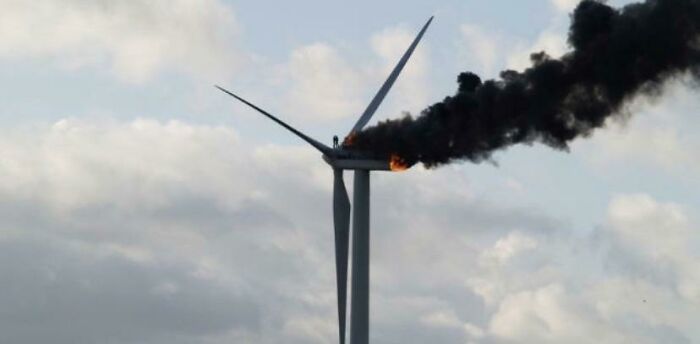 On October 29th, 2013. These Two Maintenance Workers Embrace Each Other Before Dying After The Wind Turbine They Were Working On In Ooltgensplaat, Holland Caught Fire