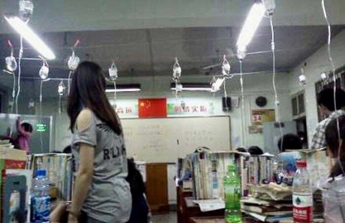 Chinese Middle/High School Collectively Receiving Intravenous (Iv) Drips To Improve Performance While Studying For Their Upcoming Exam