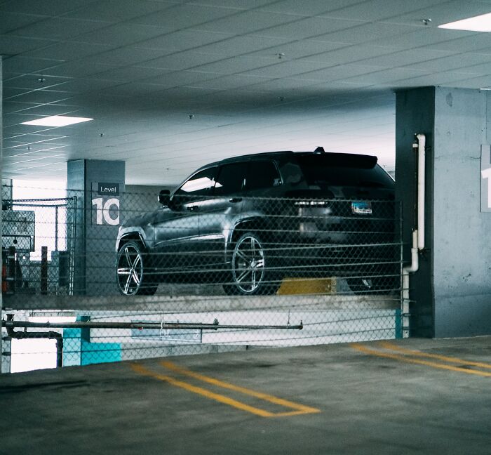 Black Jeep Parked In A Underground Parking Lot 