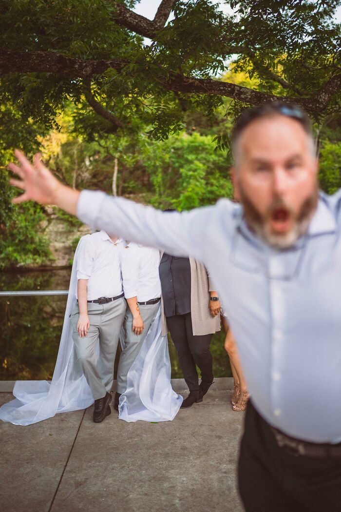 Got Our Wedding Pictures Back Today, My Dad Photobombing Us Is Definitely My Favorite