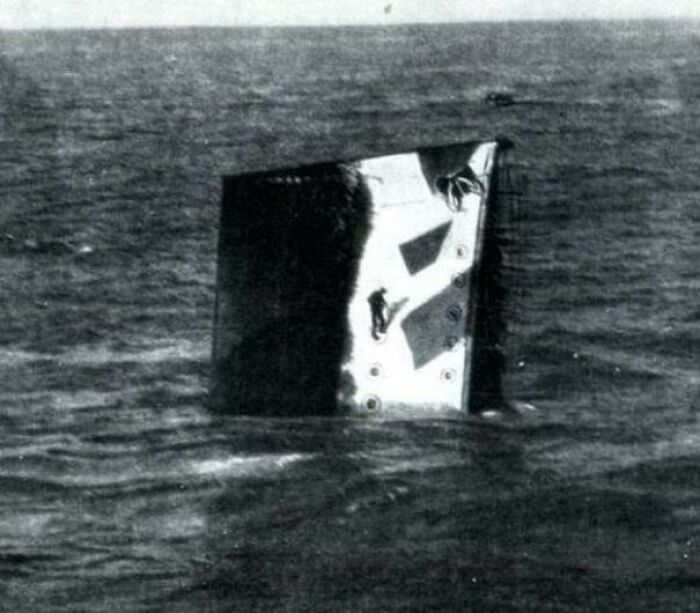 Sailor Waiting To Be Rescued From His Sinking Ship