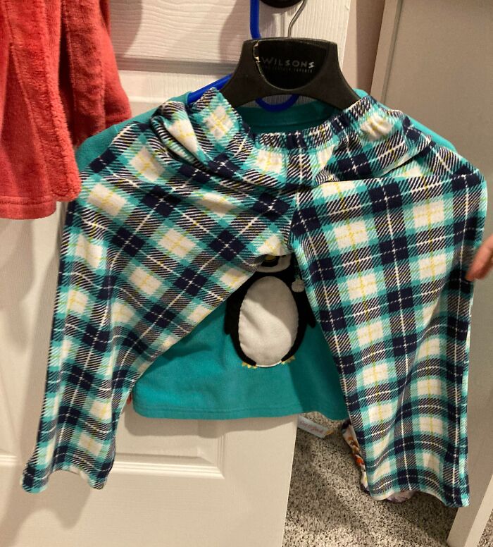 My Daughter Said She Was Going To Hang Up Her Pajamas For Pajama Day At School. This Is How She Put The Pants On The Hanger